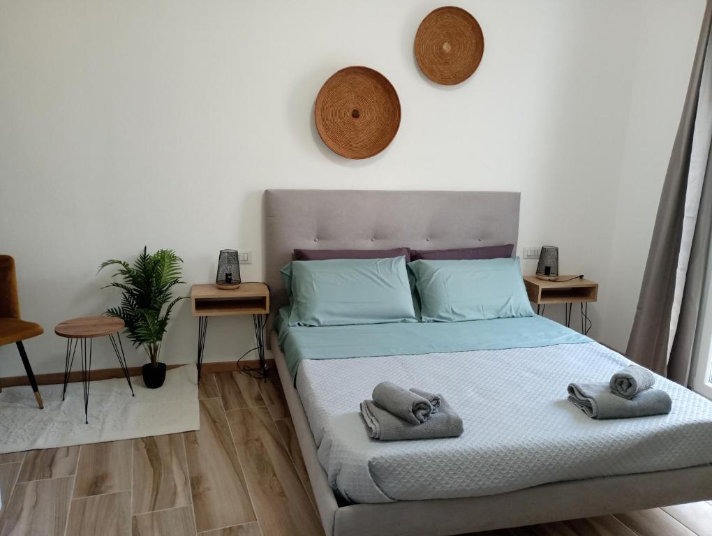Postel nebo postele na pokoji v ubytování NIU Rooms