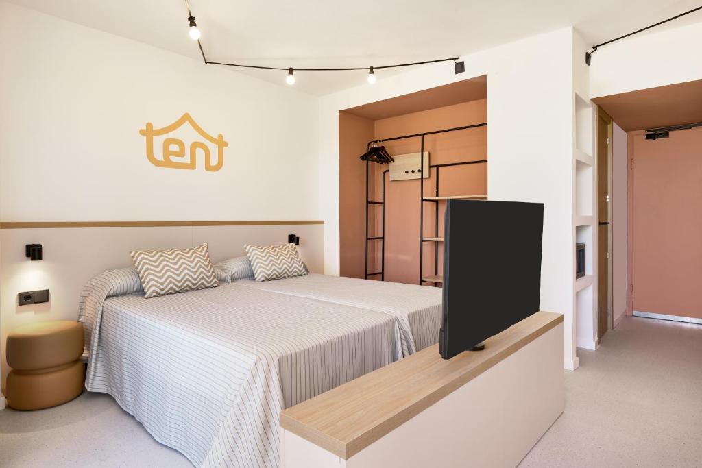 Postel nebo postele na pokoji v ubytování tent Calvia Beach