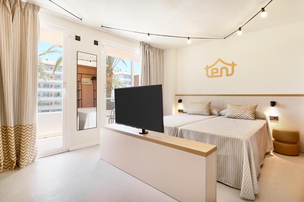 Postel nebo postele na pokoji v ubytování tent Calvia Beach