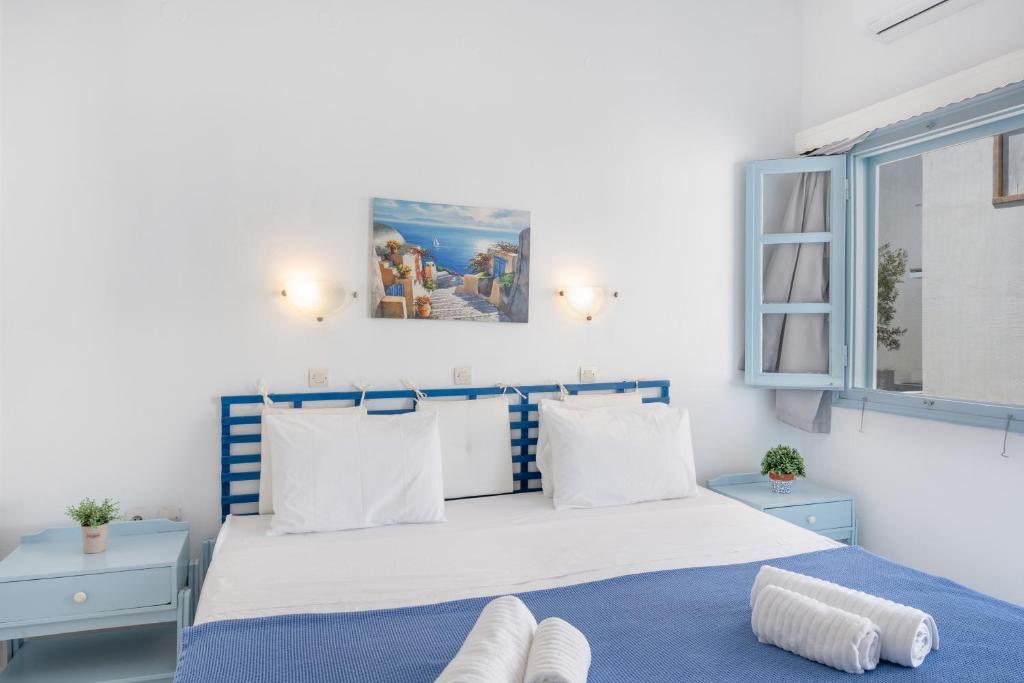 Postel nebo postele na pokoji v ubytování Pico Bello Patmos 14