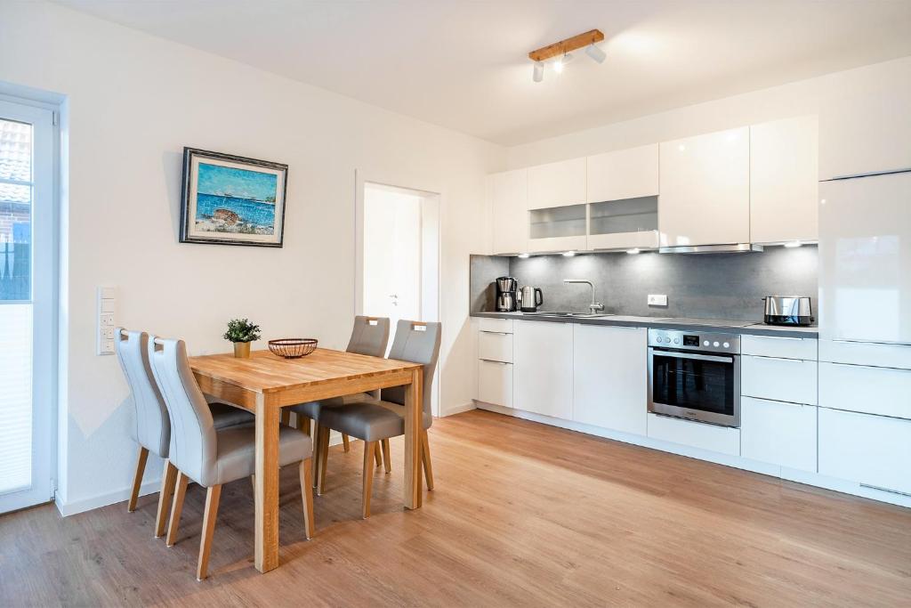 Kuchyň nebo kuchyňský kout v ubytování Apartment am Deich 01
