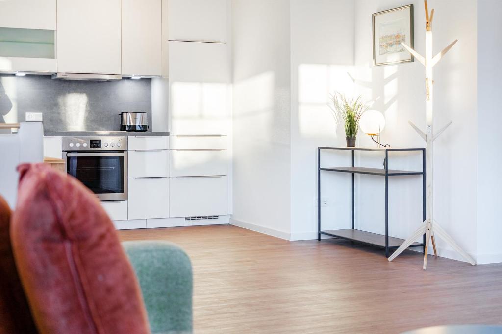 Kuchyň nebo kuchyňský kout v ubytování Apartment am Deich 01