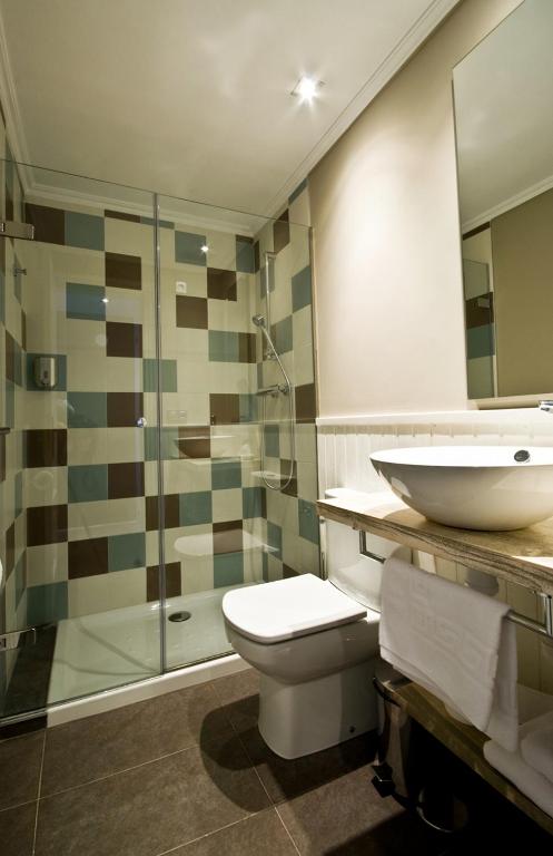 Koupelna v ubytování Hotel Salbatoreh