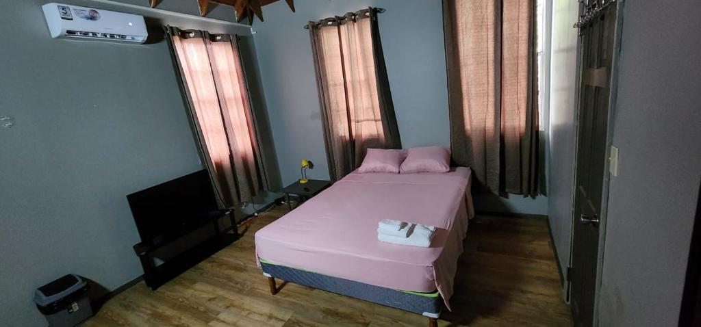 Postel nebo postele na pokoji v ubytování JJ Guest House