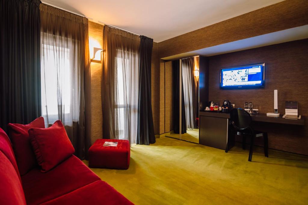 TV a/nebo společenská místnost v ubytování Plaza V Executive Hotel