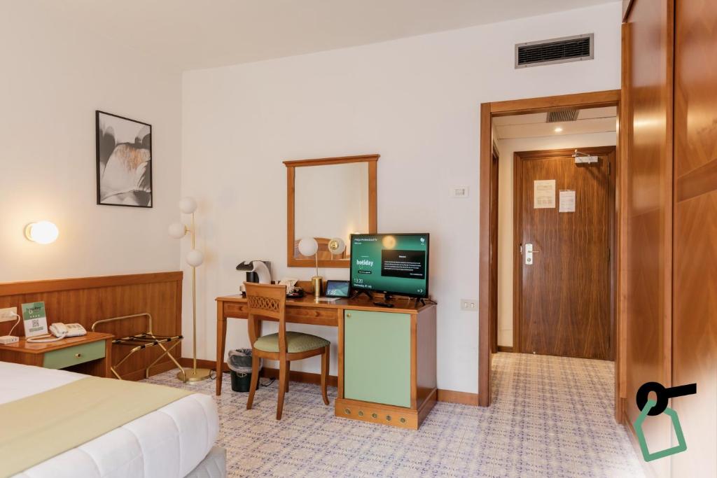 Kuchyň nebo kuchyňský kout v ubytování HOTIDAY Room Collection - Sorrento