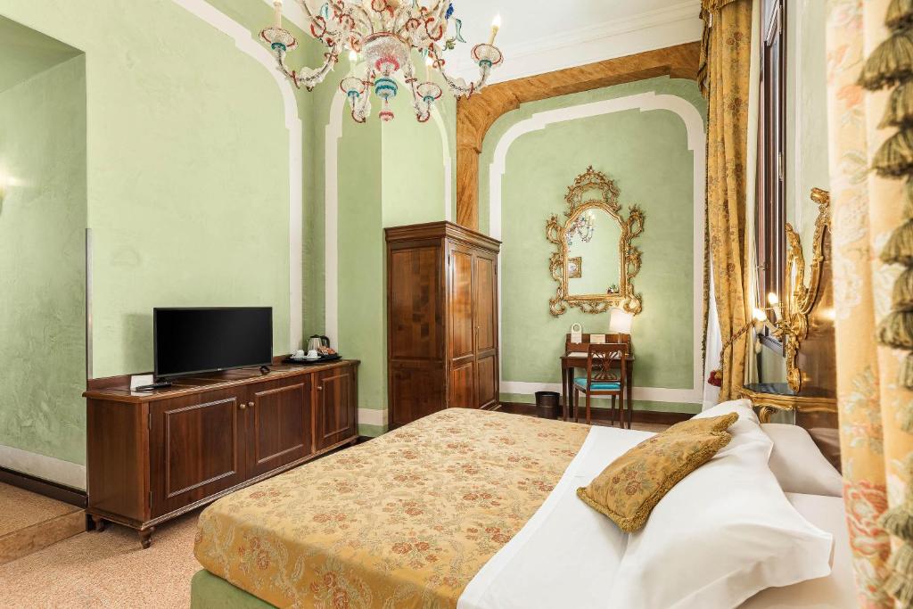 TV a/nebo společenská místnost v ubytování Hotel San Moisè
