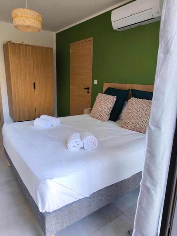 Postel nebo postele na pokoji v ubytování Hôtel A Stretta