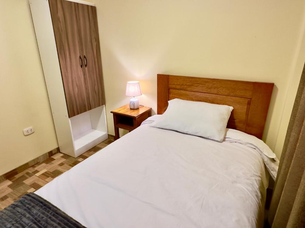 Postel nebo postele na pokoji v ubytování Casa Medina Hostal