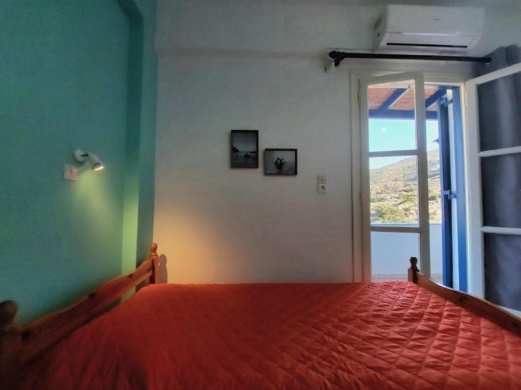 A bed or beds in a room at Koukos