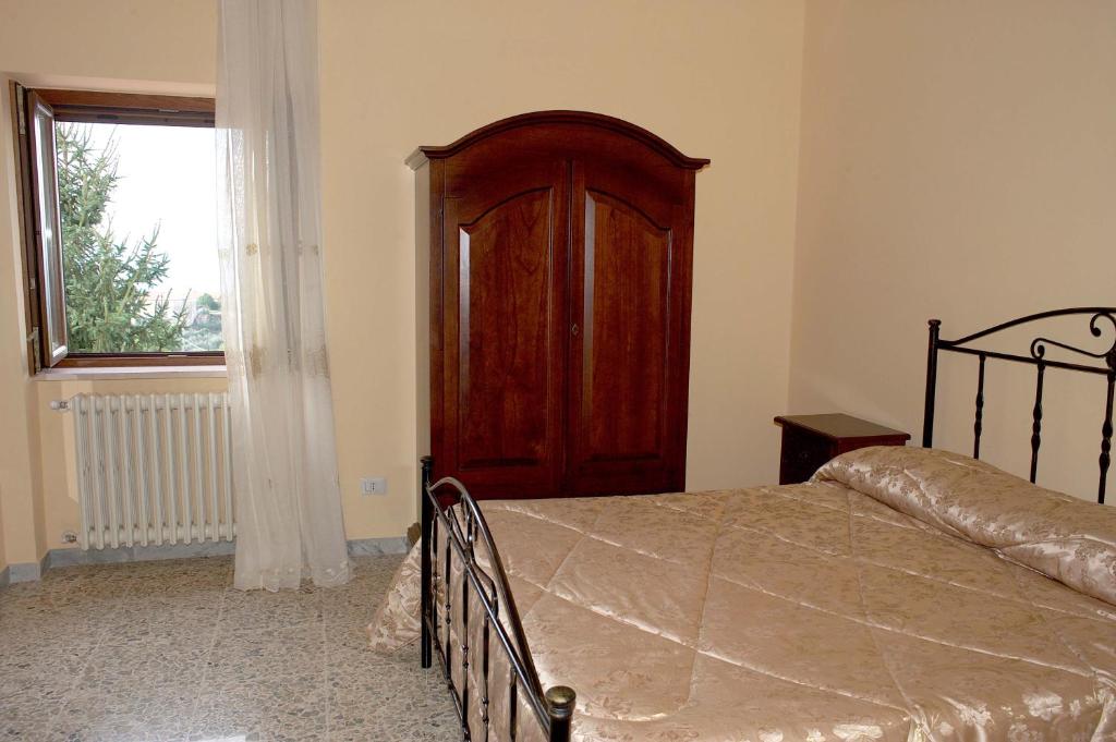 Postel nebo postele na pokoji v ubytování La Staccionata
