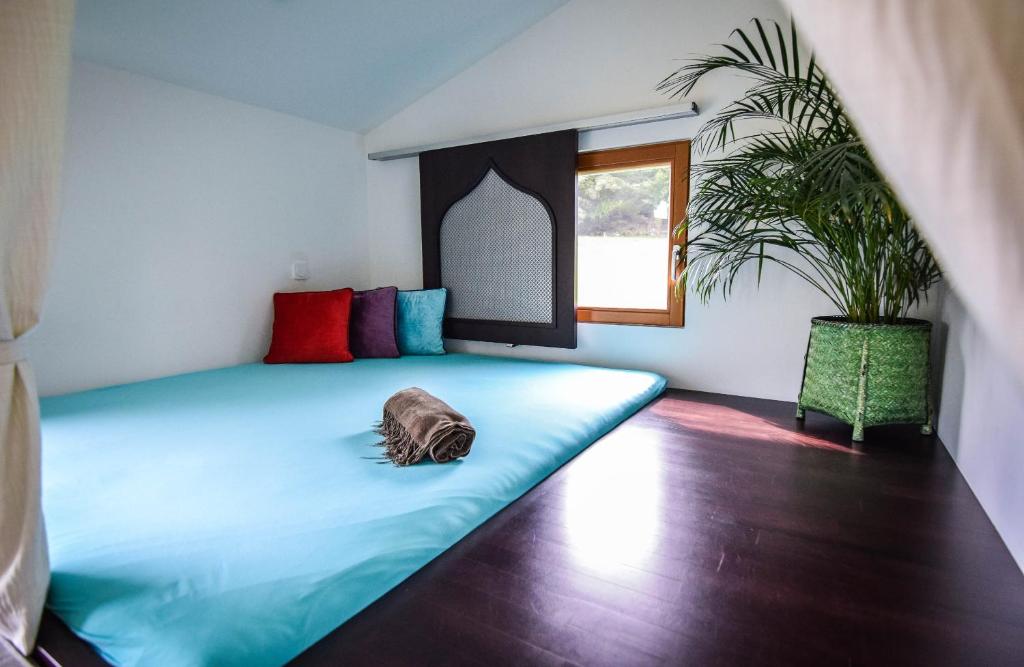 Postel nebo postele na pokoji v ubytování Naturchalets 7 Sentidos
