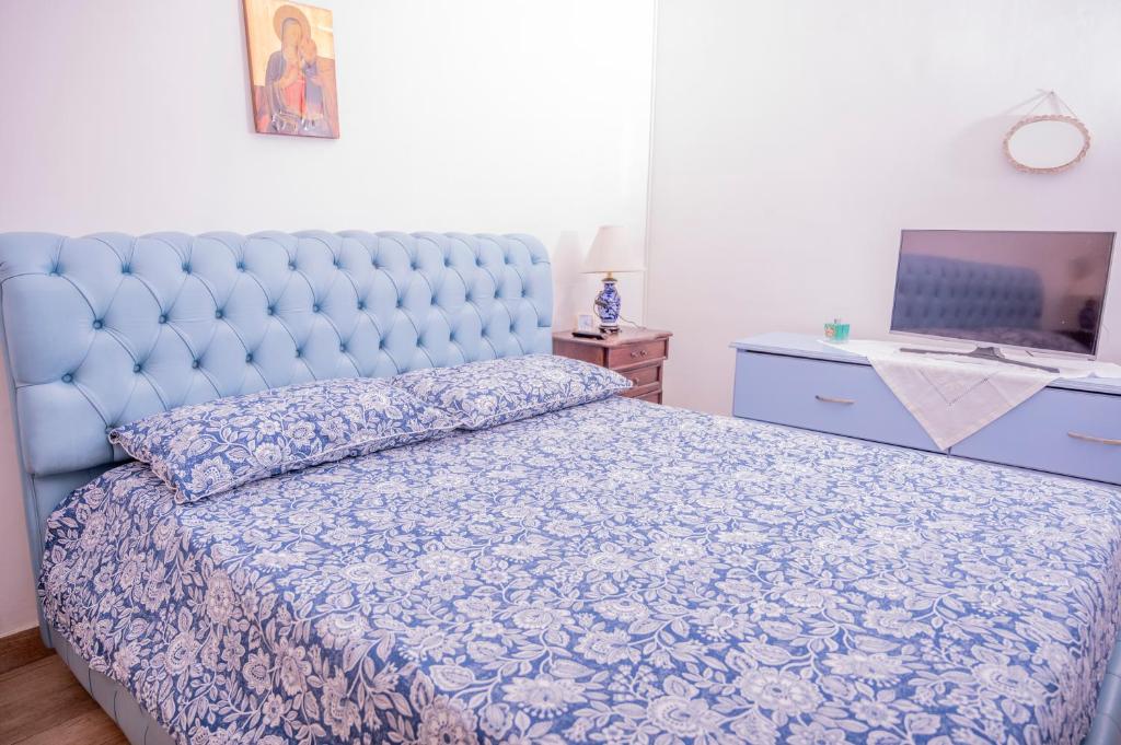 Łóżko lub łóżka w pokoju w obiekcie Dimora Belvedere