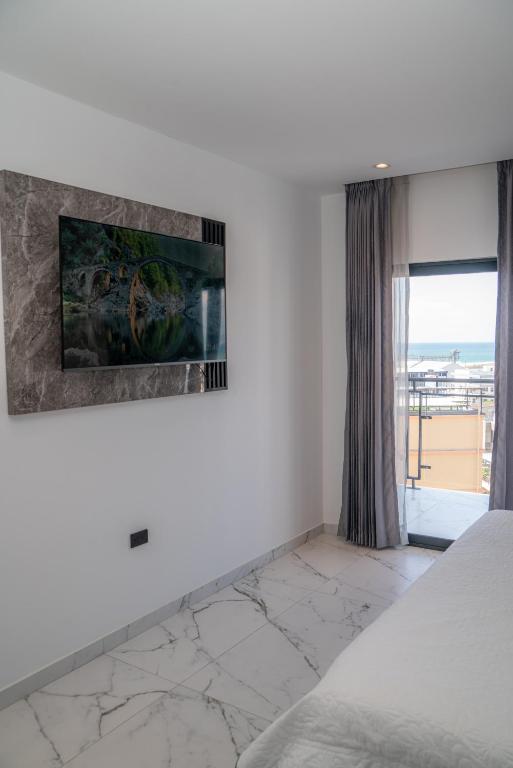 Postel nebo postele na pokoji v ubytování Manta Surf Hotel