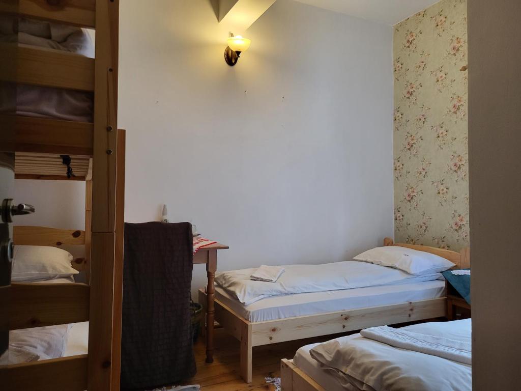 Postel nebo postele na pokoji v ubytování Pension Cabana Cetatile Ponorului