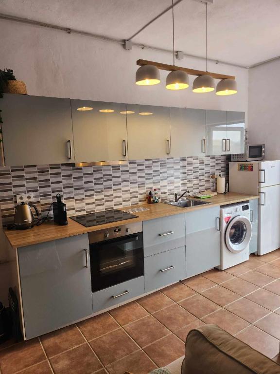Kuchyň nebo kuchyňský kout v ubytování Siempre Feliz La Casita Los Molinos