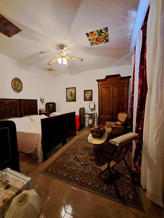Postel nebo postele na pokoji v ubytování Alchimia tra suoni e colori