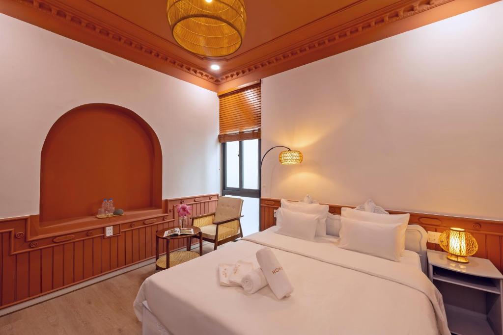Giường trong phòng chung tại MiLa - Homestay in Hue