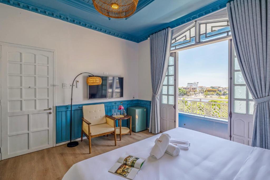 Giường trong phòng chung tại MiLa - Homestay in Hue