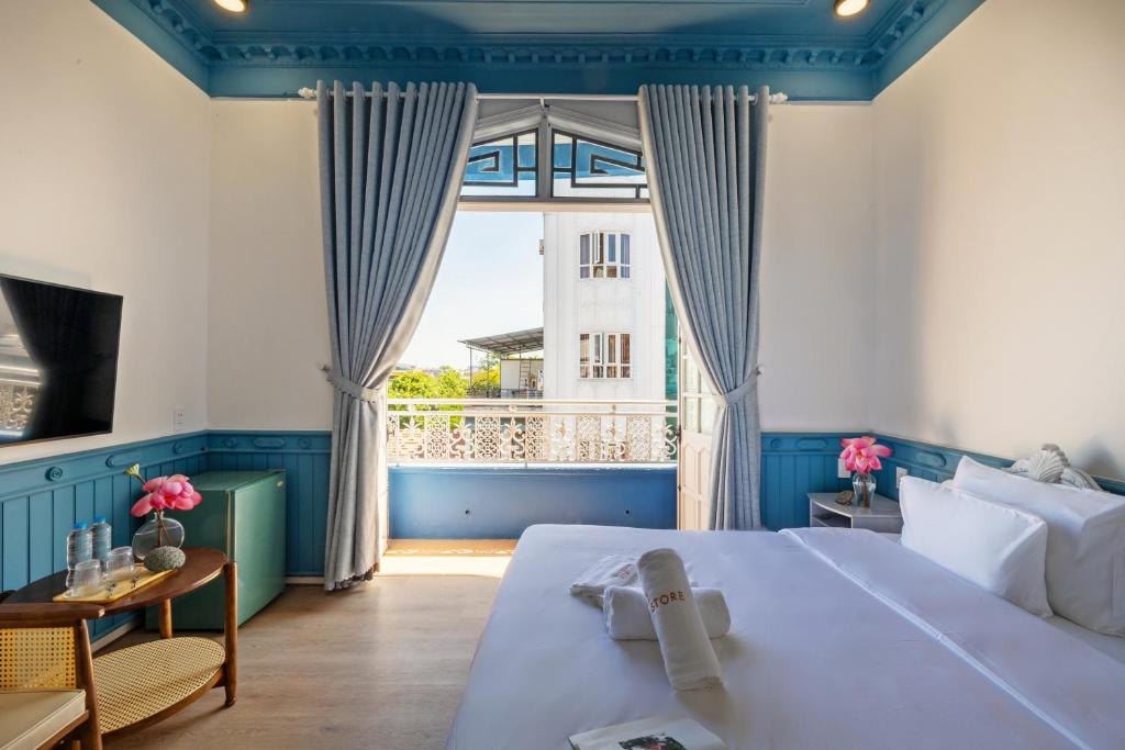 Giường trong phòng chung tại MiLa - Homestay in Hue
