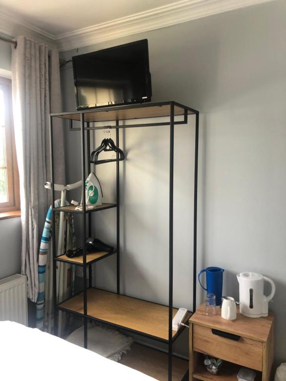 Postel nebo postele na pokoji v ubytování Manorlodge