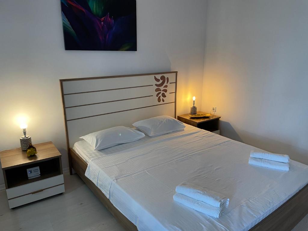 Giường trong phòng chung tại Air Residence 1