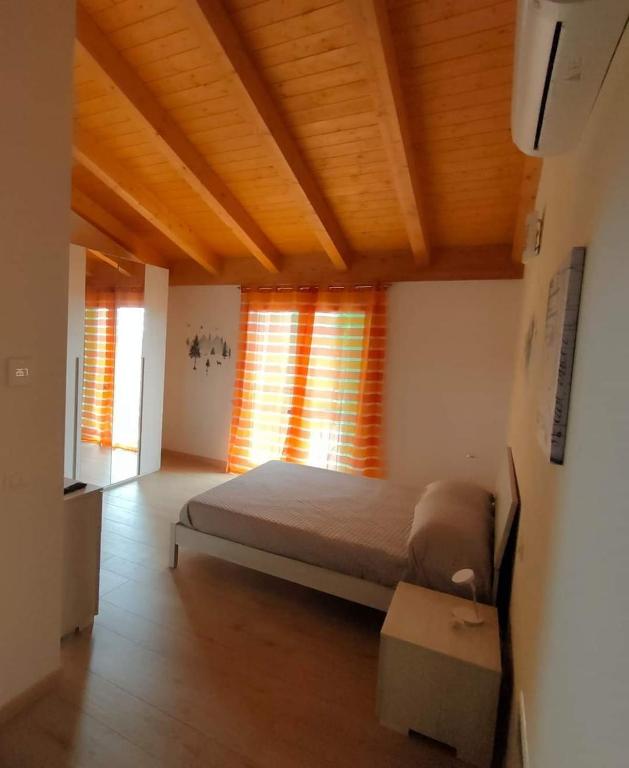 Postel nebo postele na pokoji v ubytování Corte del Sole