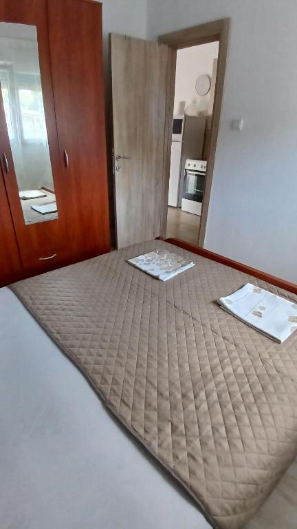 Postel nebo postele na pokoji v ubytování MarBis Apartmani near the sea