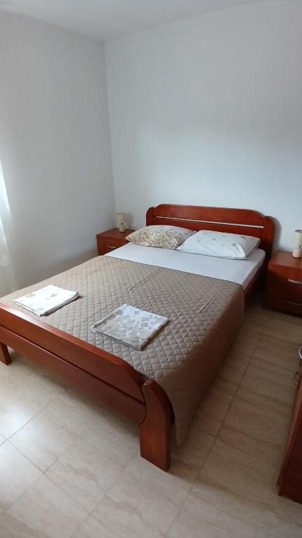 Postel nebo postele na pokoji v ubytování MarBis Apartmani near the sea