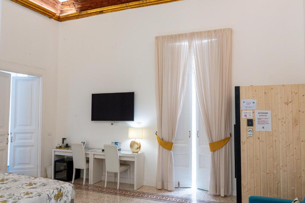 A television and/or entertainment centre at 1811 Residenza Storica