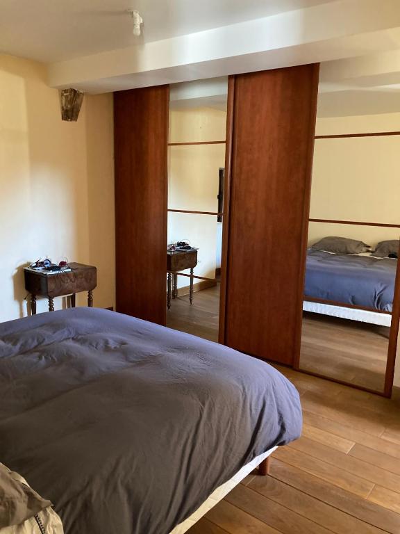Postel nebo postele na pokoji v ubytování Entre Bourgogne et Morvan