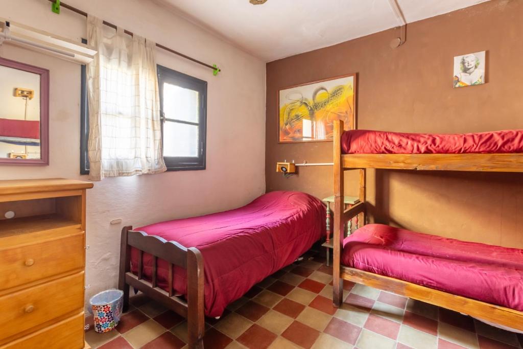 Postel nebo postele na pokoji v ubytování Puerta Azul Hostel