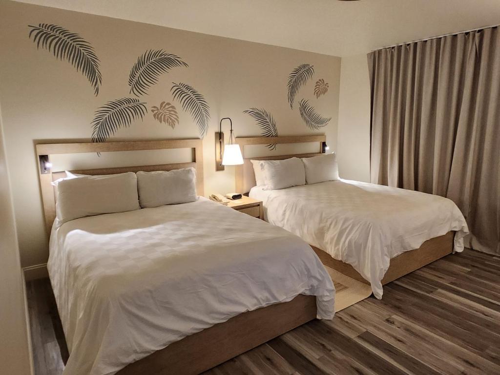 Postel nebo postele na pokoji v ubytování Coco Reef Bermuda