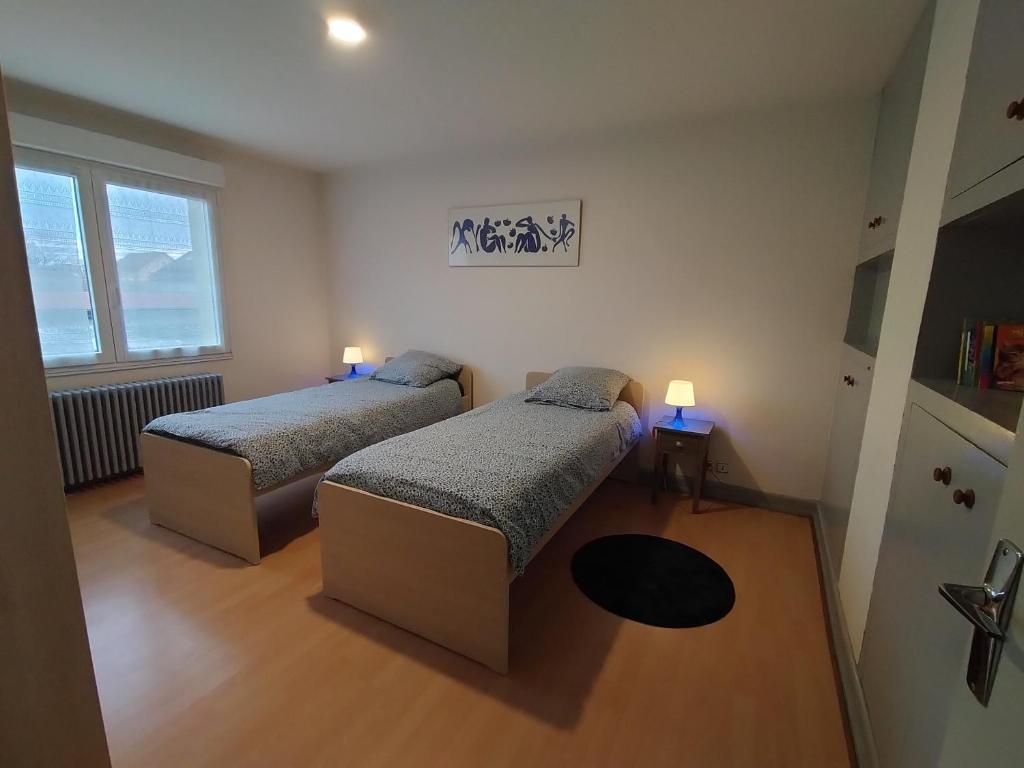 Postel nebo postele na pokoji v ubytování Escale