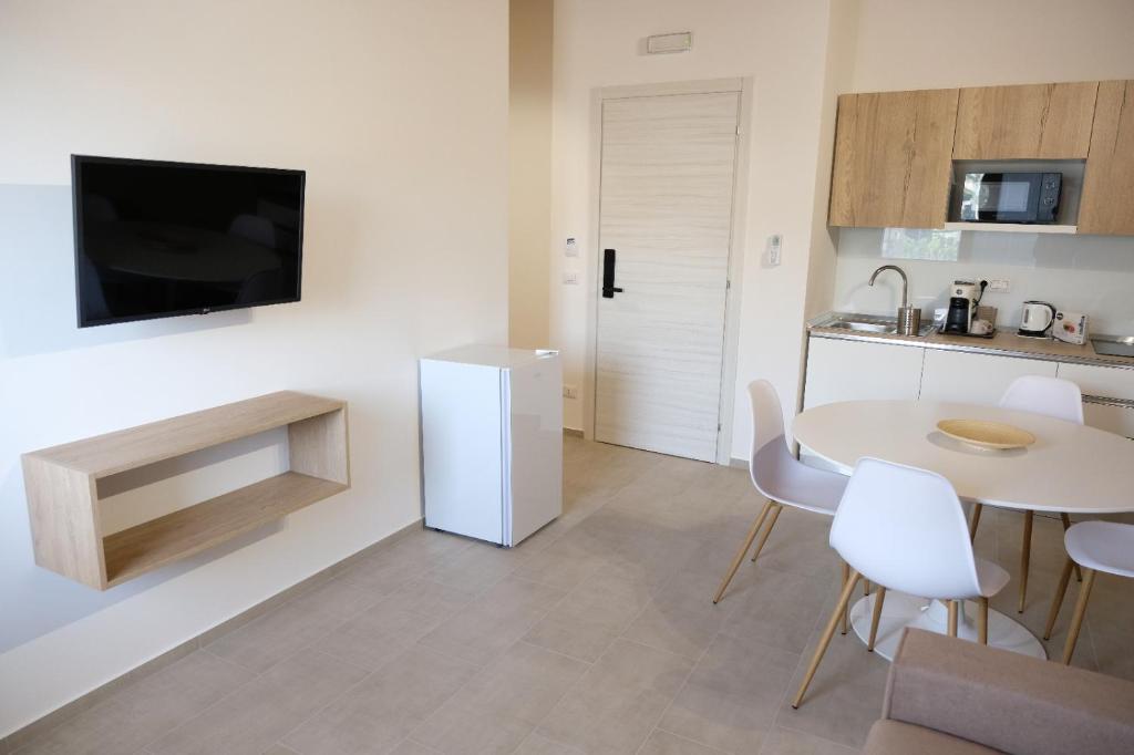 Kuchyň nebo kuchyňský kout v ubytování Salerno Rooms