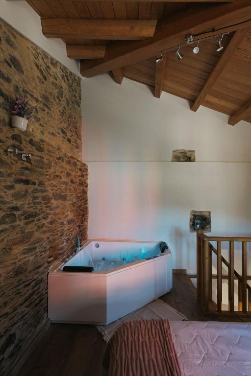 Кровать или кровати в номере casa Robaleira
