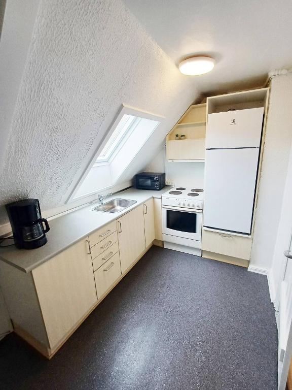 Kuchyň nebo kuchyňský kout v ubytování Cozy 1 bedroom apartment A