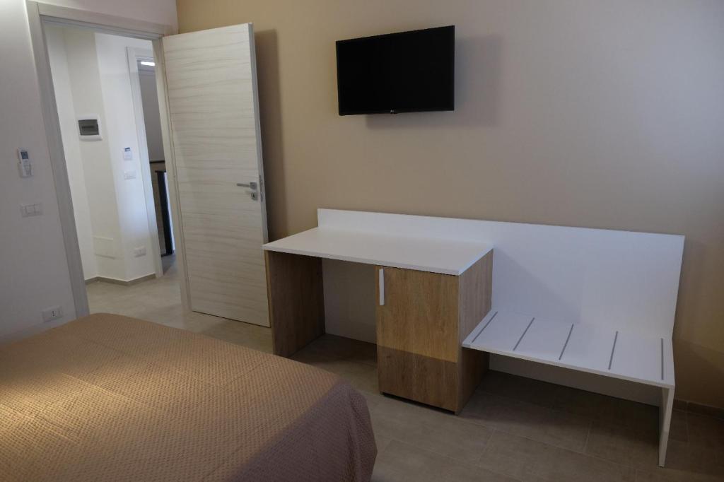 TV a/nebo společenská místnost v ubytování Salerno Rooms