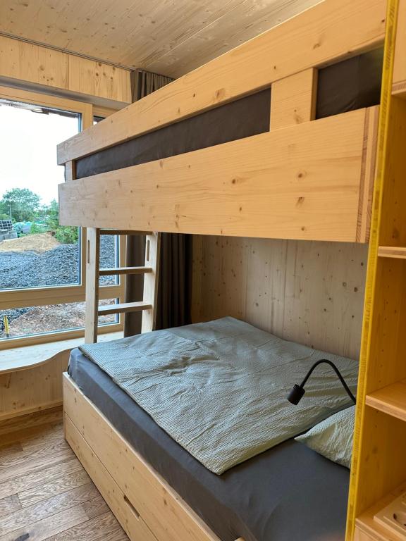Postel nebo postele na pokoji v ubytování LindenGut Bio Hotel & Bio Herberge