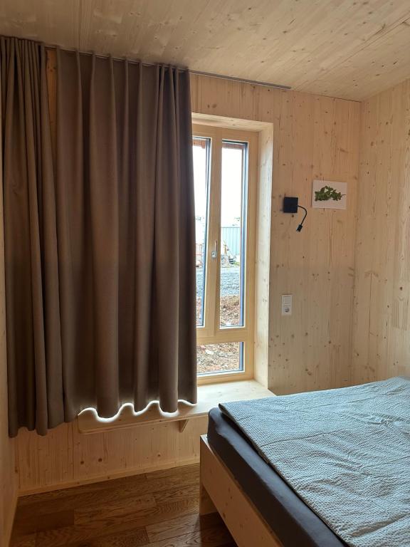 Postel nebo postele na pokoji v ubytování LindenGut Bio Hotel & Bio Herberge