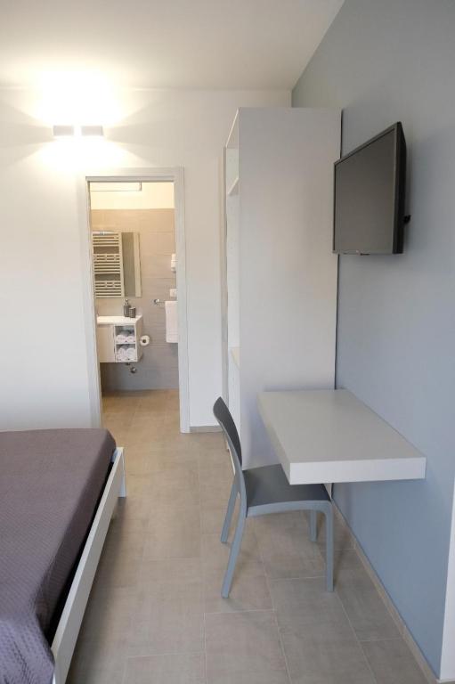 TV a/nebo společenská místnost v ubytování Salerno Rooms