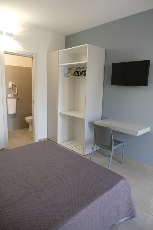 TV a/nebo společenská místnost v ubytování Salerno Rooms