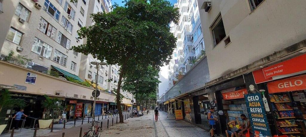 a street in a city with tall buildings at SUH Copacabana 01 Nice Balcony Close To Beach in Rio de Janeiro