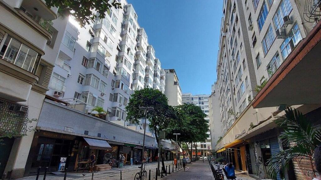 a street in a city with tall buildings at SUH Copacabana 01 Nice Balcony Close To Beach in Rio de Janeiro