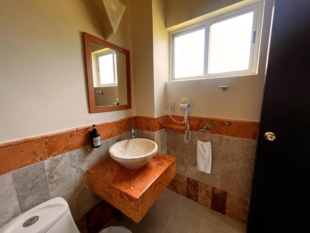 Koupelna v ubytování Hotel Palacio Maya