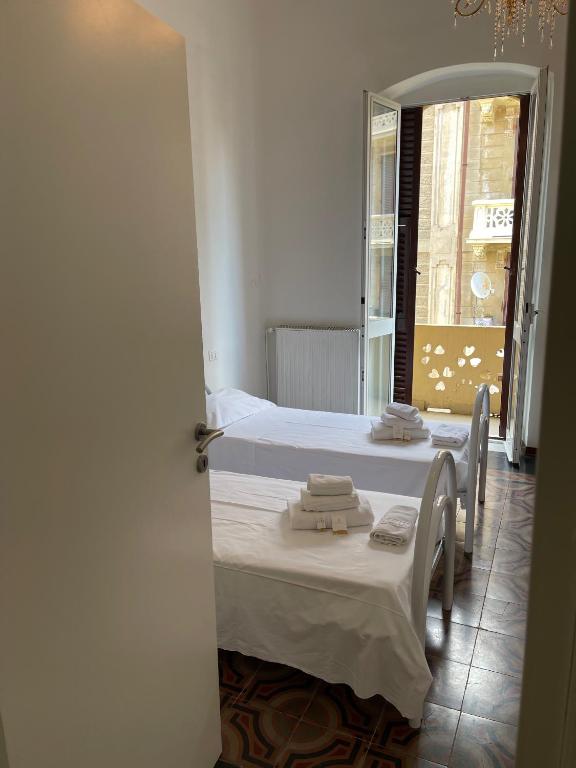 Postel nebo postele na pokoji v ubytování Cavour 414