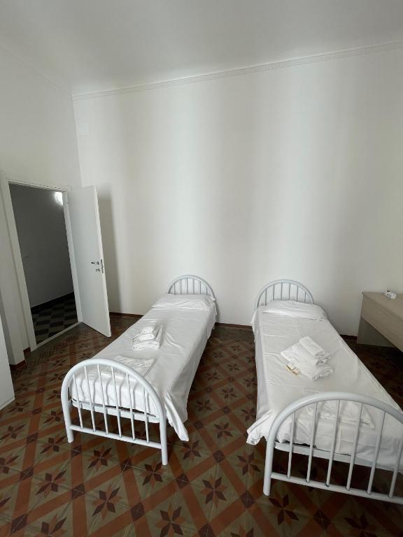 Postel nebo postele na pokoji v ubytování Cavour 414