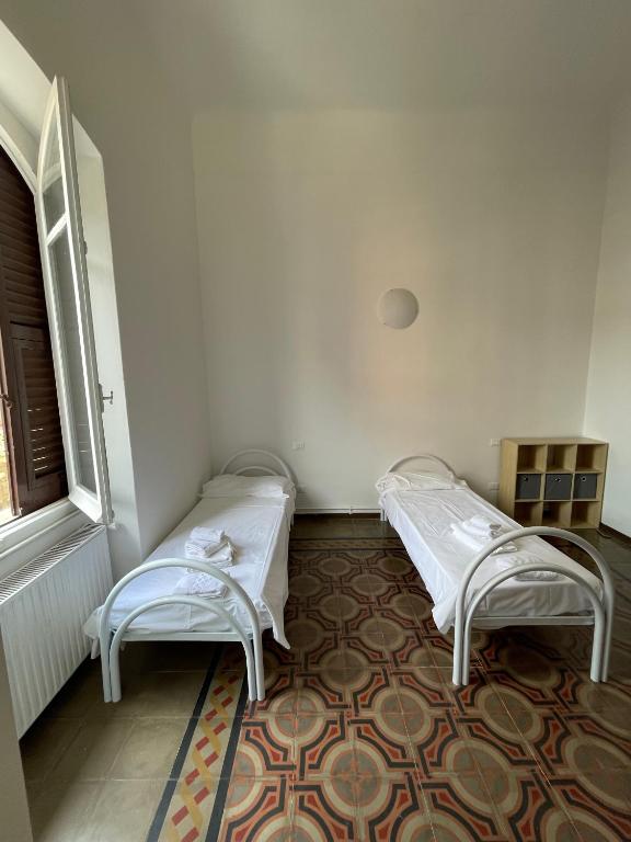Postel nebo postele na pokoji v ubytování Cavour 414