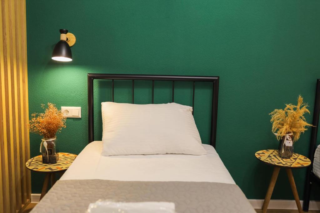 Voodi või voodid majutusasutuse Mohika Boutique Aparthotel toas