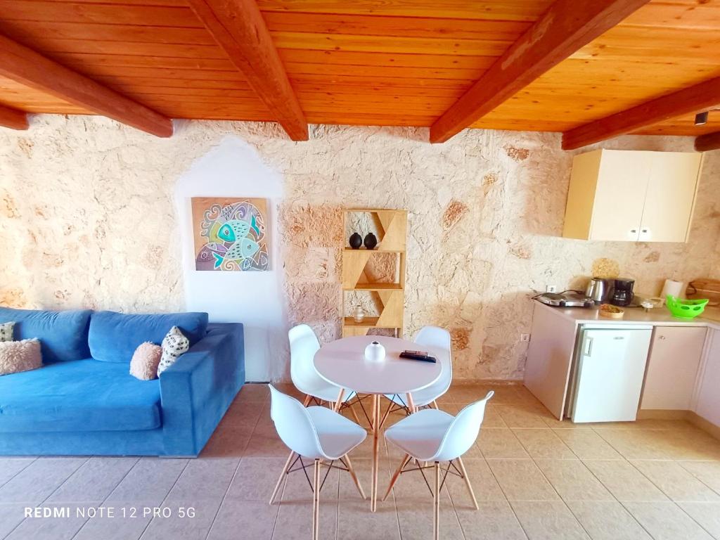 Kuchyň nebo kuchyňský kout v ubytování Spasmata Village Stone Maisonette